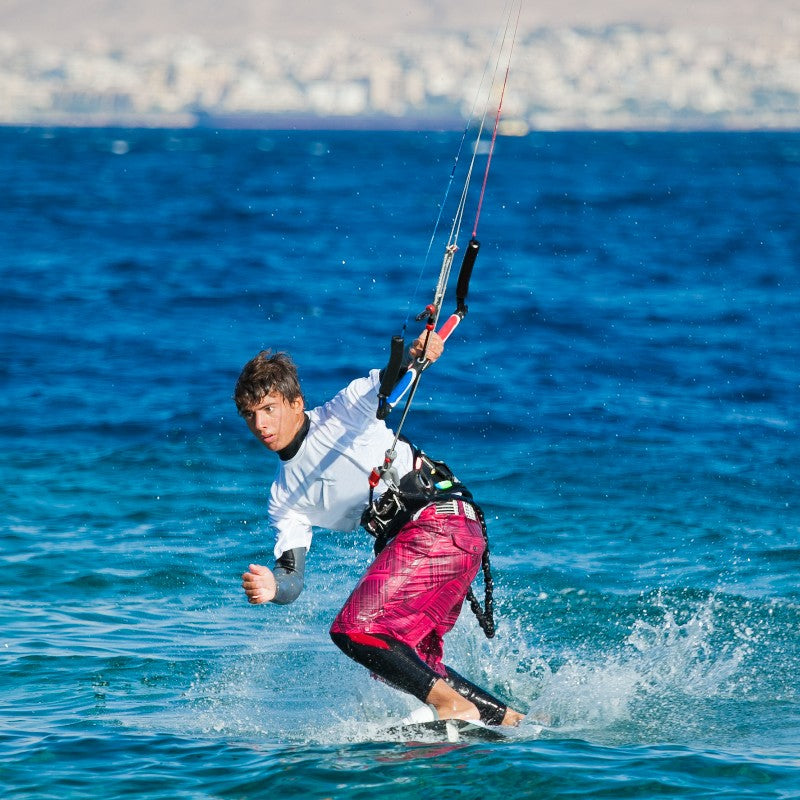 a man surfing on sea wave - Swim & Surf Collection