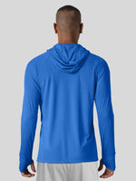 A man viewed from the back wearing a bright blue long-sleeve hooded athletic shirt 