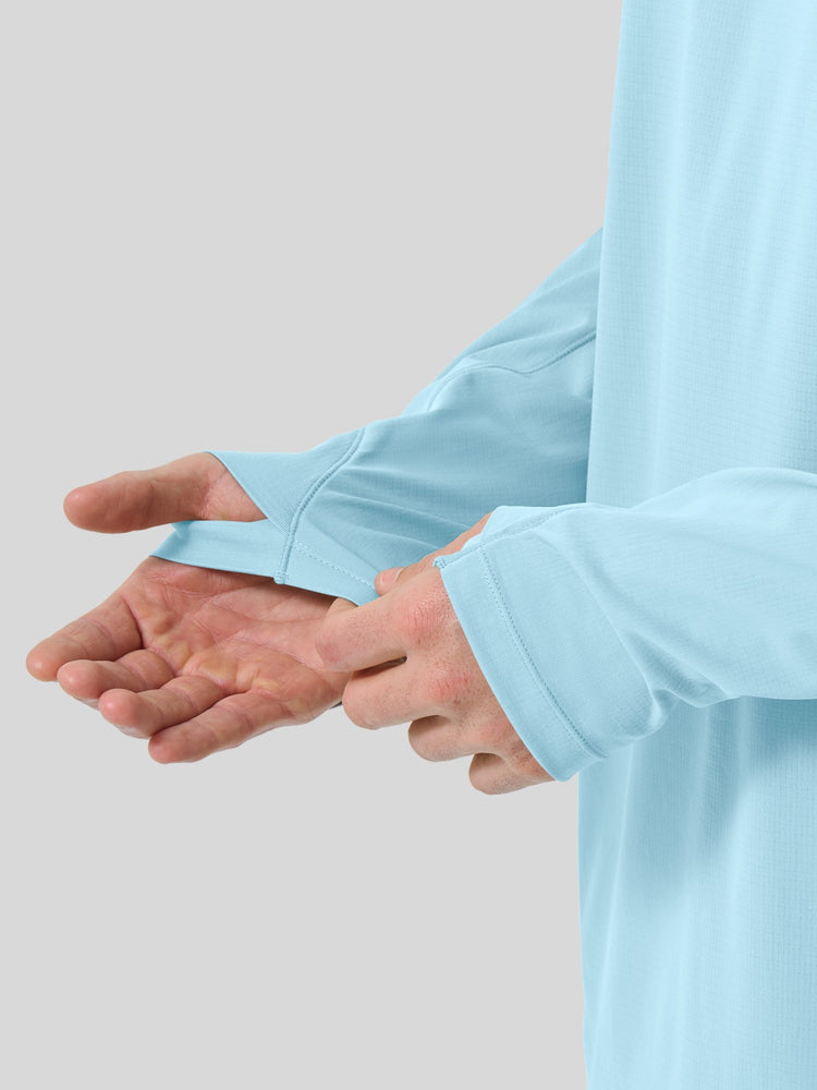 A men wearing a light blue long-sleeve sun shirt UPF50+ 