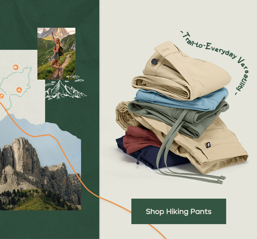 A promotional graphic for hiking pants featuring a stack of folded pants in beige, blue, burgundy, and navy -Shop Hiking Pants'