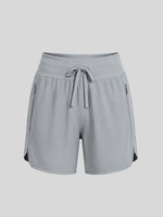 Women's light gray athletic shorts with a drawstring waist and side pockets 