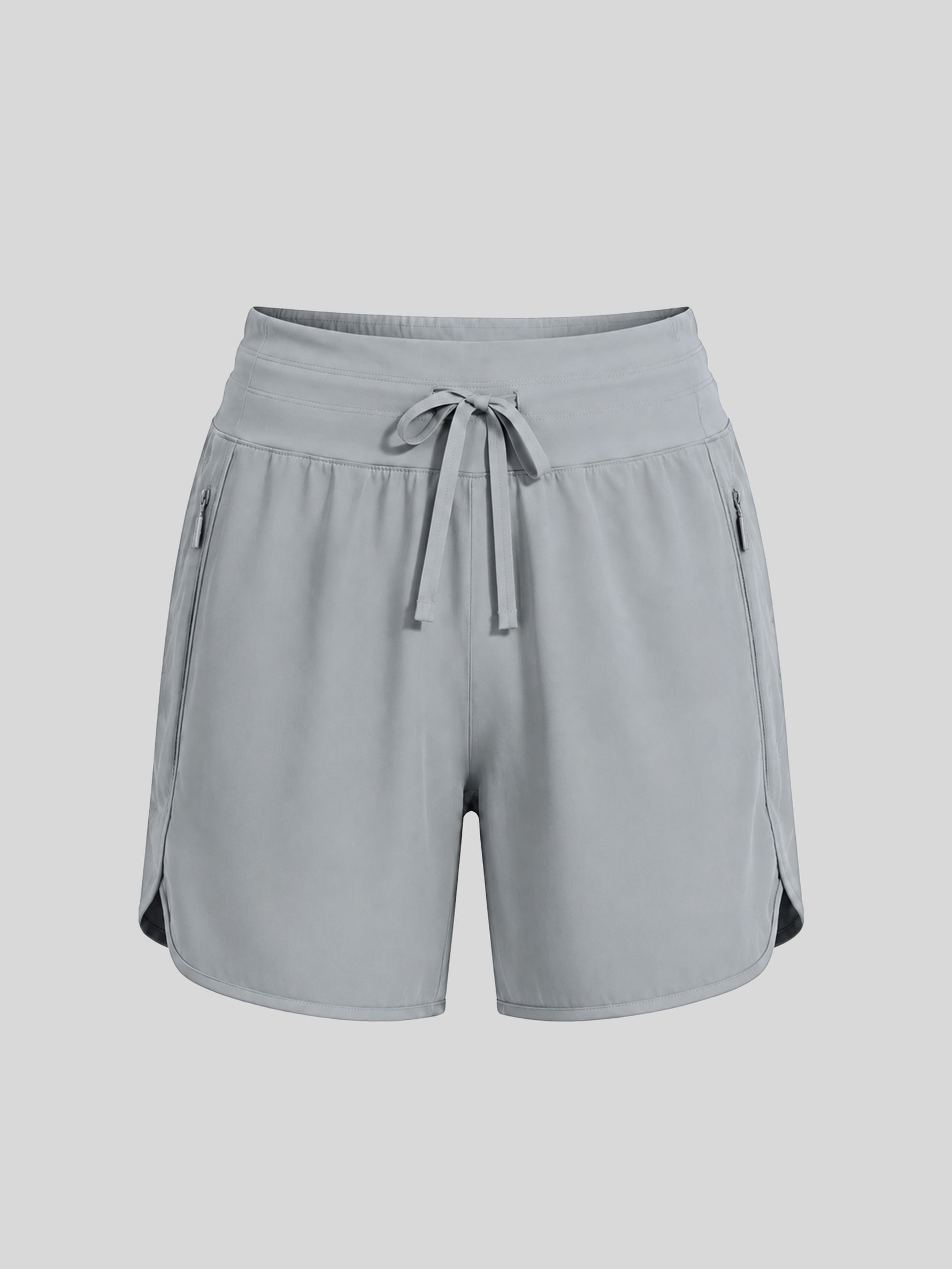 Women's light gray athletic shorts with a drawstring waist and side pockets 