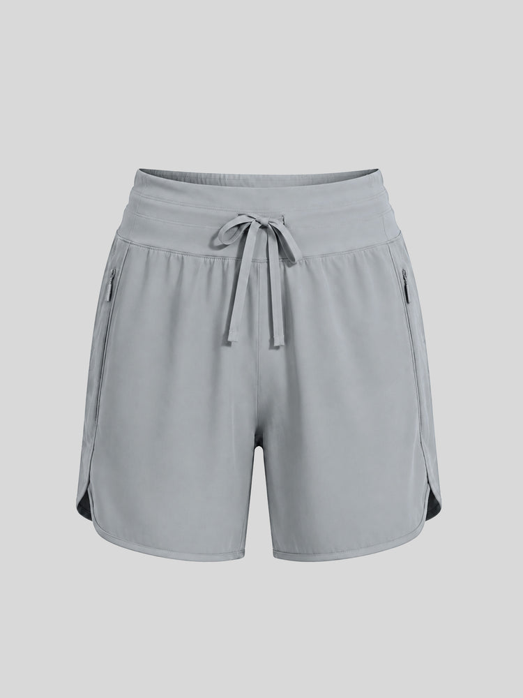 Women's light gray athletic shorts with a drawstring waist and side pockets 