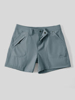 A pair of women's slate blue outdoor shorts with a button closure, zippered side pockets  
