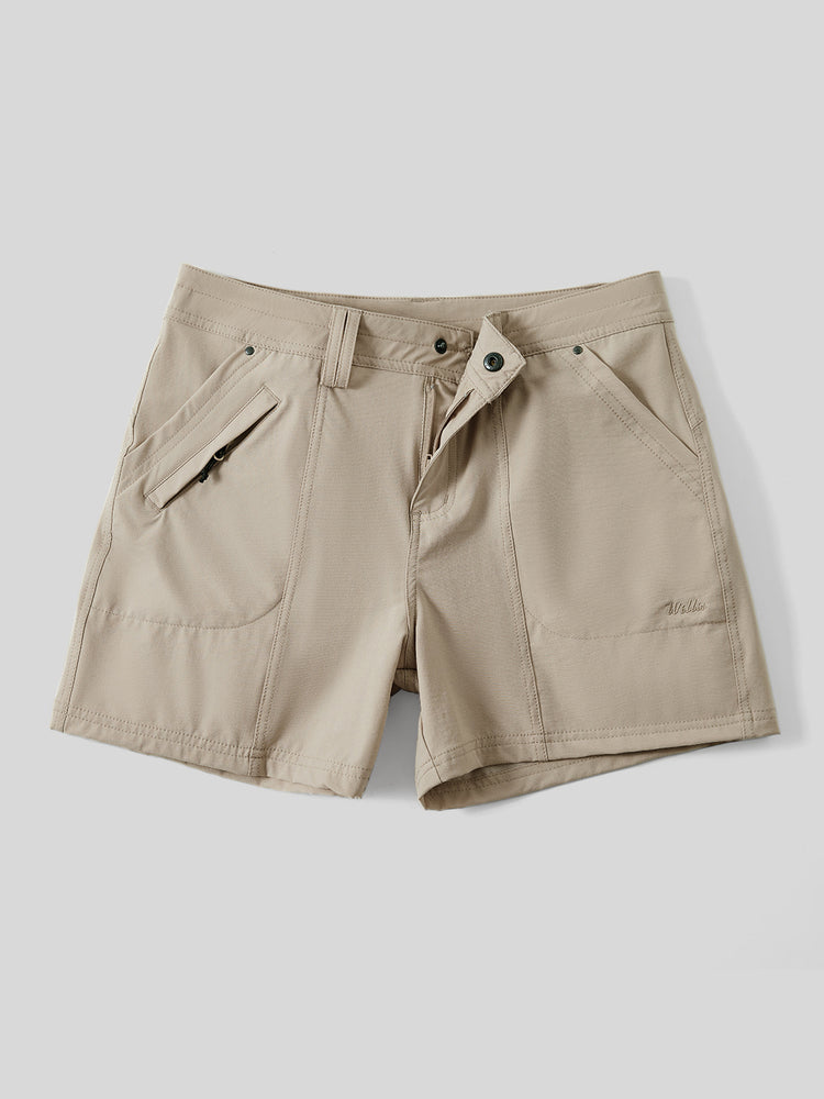 Women's beige outdoor shorts with a button closure, zippered side pockets 