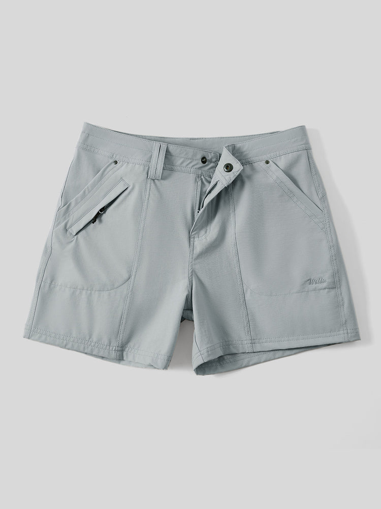 A pair of light gray outdoor shorts with a button closure, zippered side pockets 