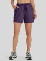 Women waring a 5 inch athletic shorts with cargo pockets 