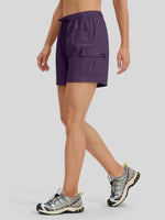 A model wearing purple outdoor cargo shorts 