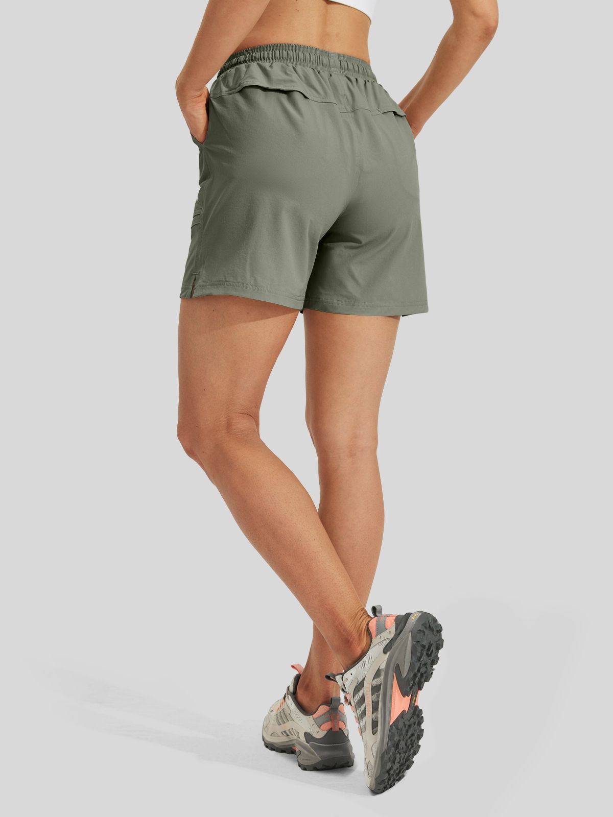 A model from the waist down wearing lightweight drawstring shorts back-view 