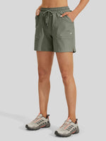 A model from the waist down wearing lightweight drawstring shorts side-view 
