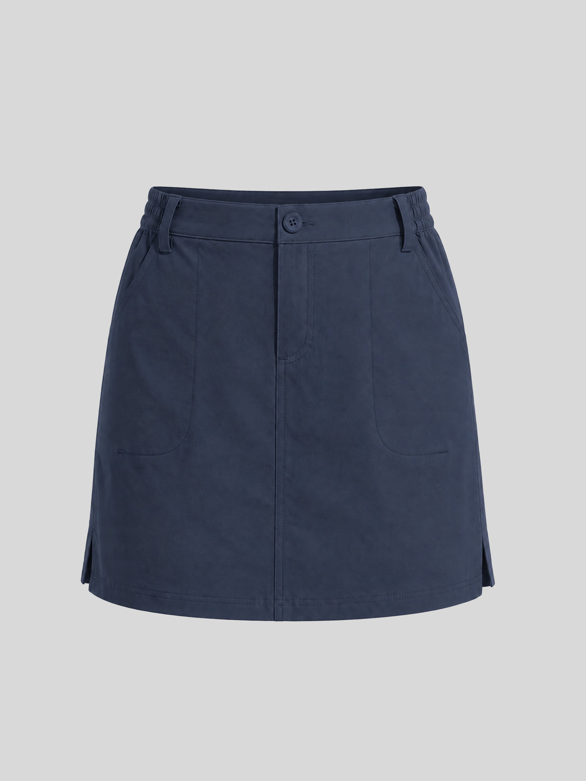A navy blue utility-style mini skirt with a button closure at the waist, belt loops, side pockets, and a flared silhouette, 
