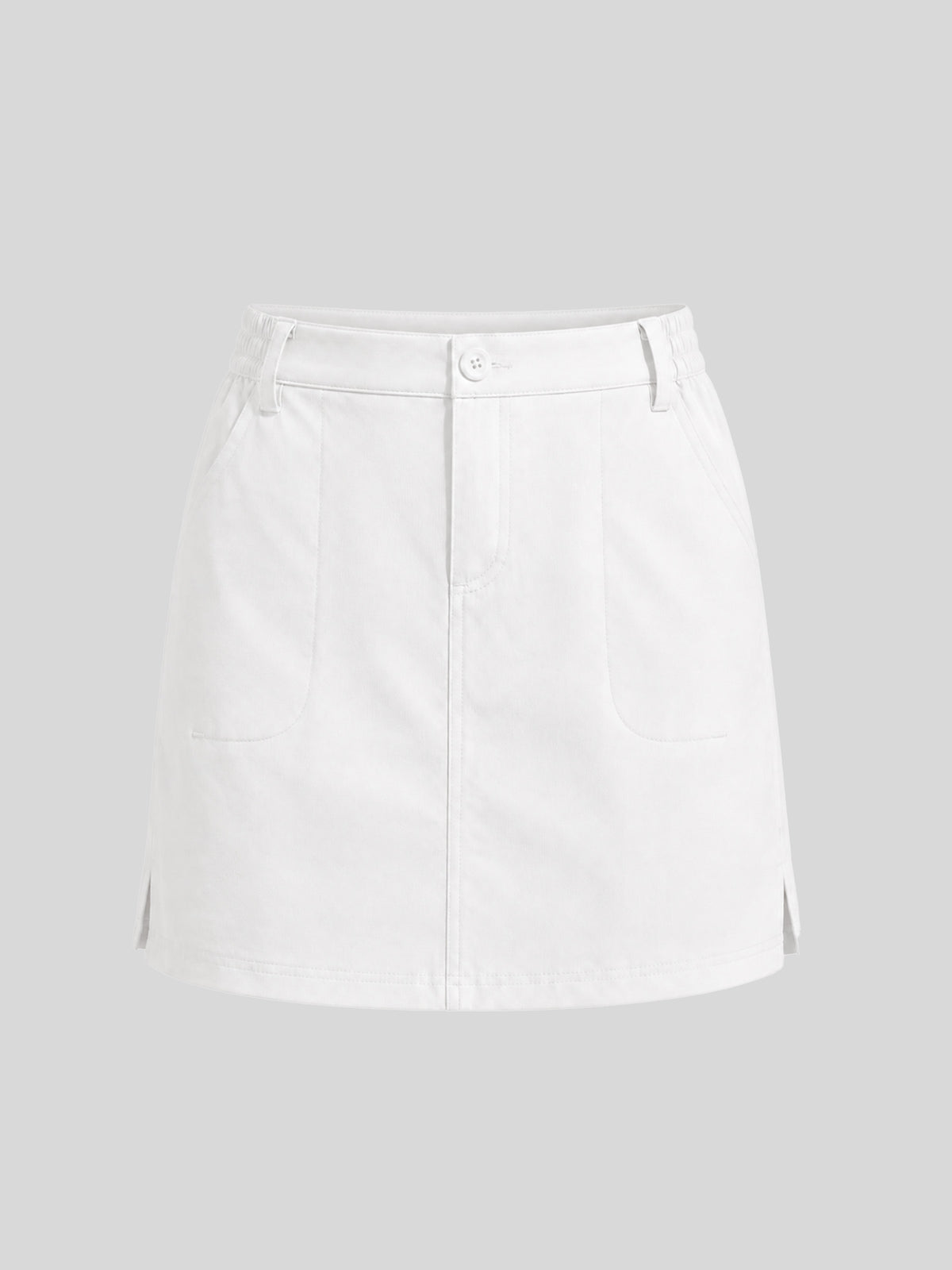 A white high-waisted mini skirt with a button closure, belt loops, and side slit pockets 