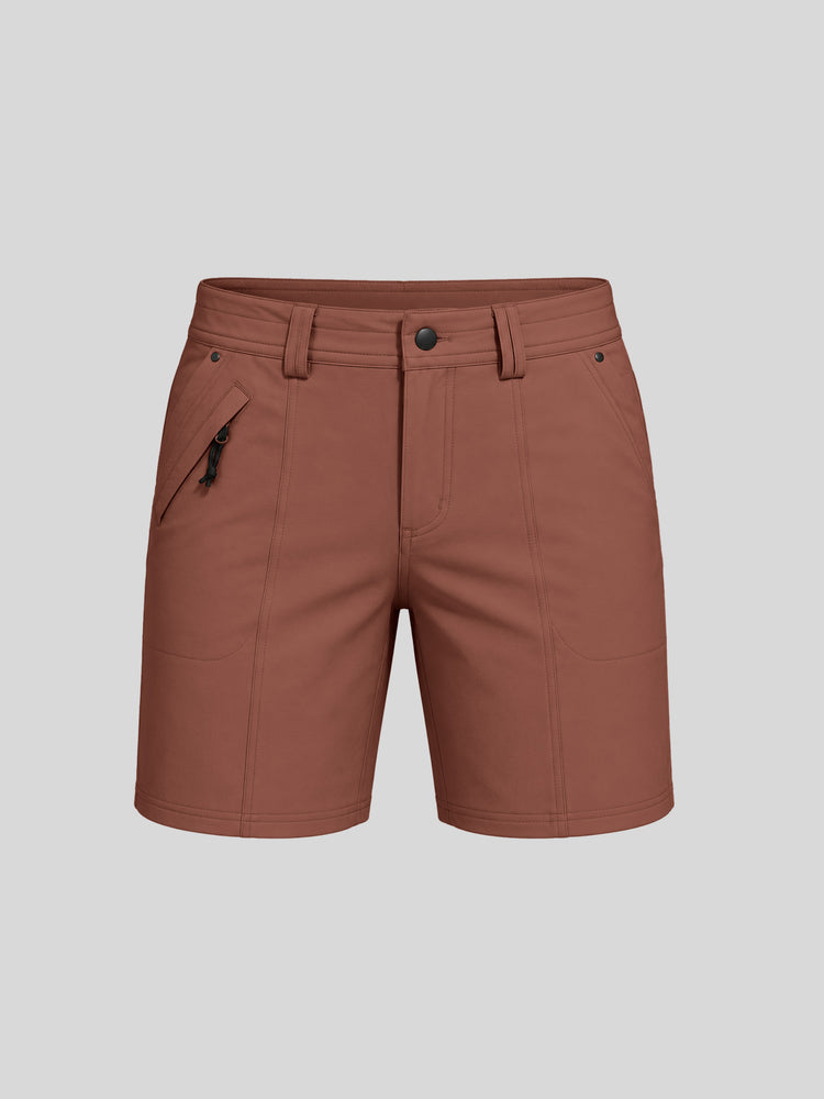 Women's brownish-terracotta outdoor golf shorts featuring a front zipper pocket and 7-inch inseam 