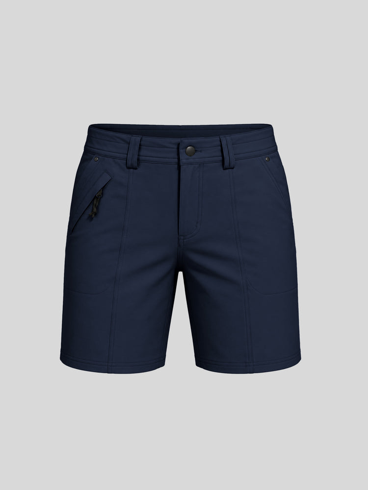 Women's deep-blue outdoor golf shorts featuring a front zipper pocket and 7-inch inseam 