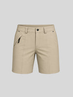 Women's khaki outdoor golf shorts featuring a front zipper pocket and 7-inch inseam 