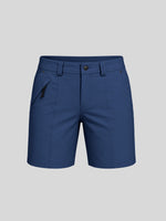 Women's navy outdoor golf shorts featuring a front zipper pocket and 7-inch inseam 