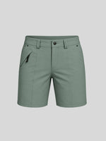 Women's sage-greeen outdoor golf shorts featuring a front zipper pocket and 7-inch inseam 
