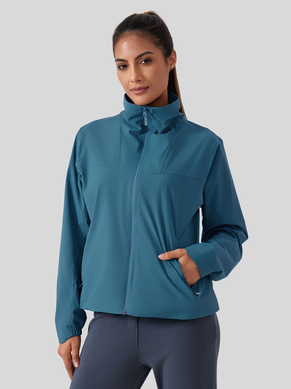 woemn's teal blue full-zip athletic jacket with a high collar, fleece-lined  #blue-ashes