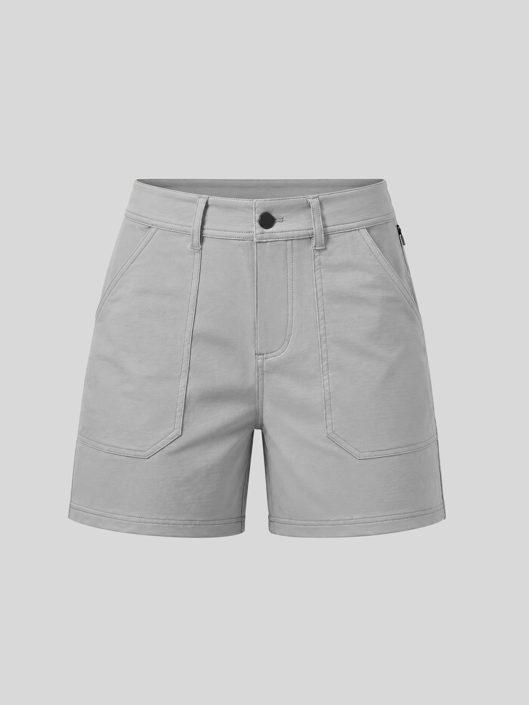A pair of light gray high-waisted shorts with a button closure, belt loops, and large front patch pockets 