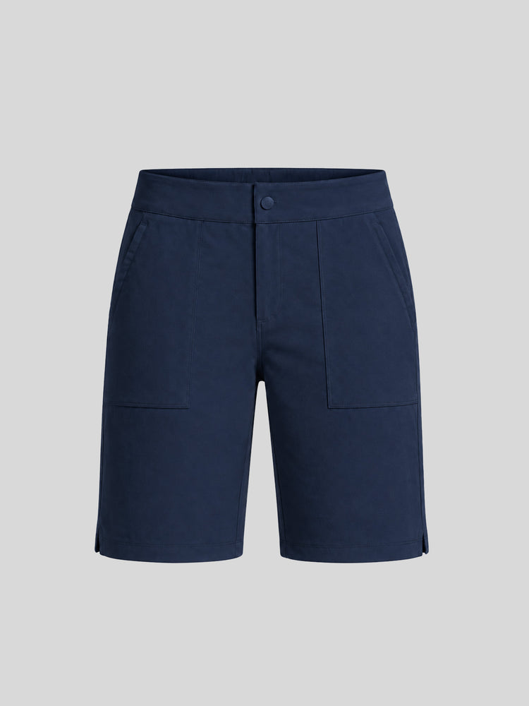 Women's deep blue utility shorts with a button closure, front welt pockets, and side pockets, front view 