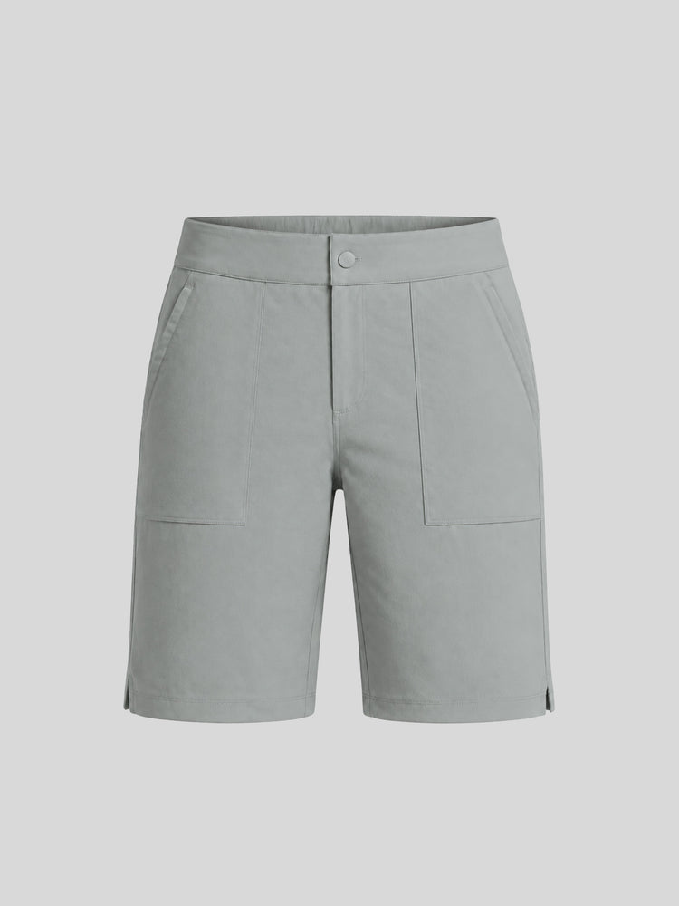 A pair of women's light gray utility shorts with a button closure, side pockets, and two large front flap pockets 